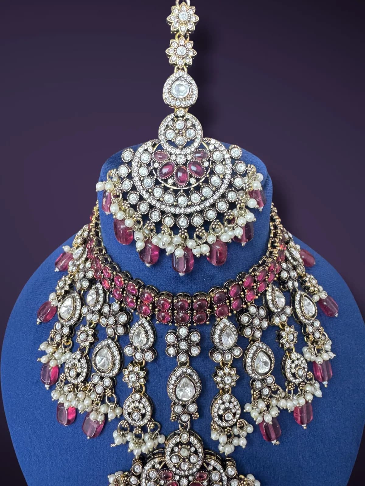 Traditional Kundan Stone Studded Bib Necklace Set with Pearl Drops - View 4